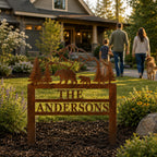 Personalized family name yard sign made from corten steel with bear and mountain scene in landscaped front yard