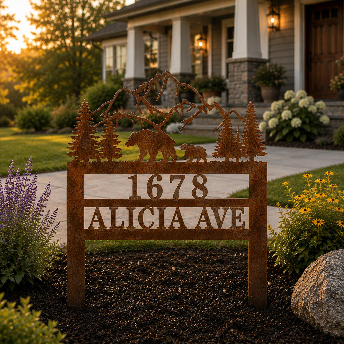 Custom corten steel address sign with house number and street name displayed in residential front yard