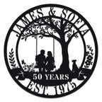 Custom metal sign with couple on swing under tree, personalized with names, dates, or anniversary messages, laser-cut steel with powder coat finish