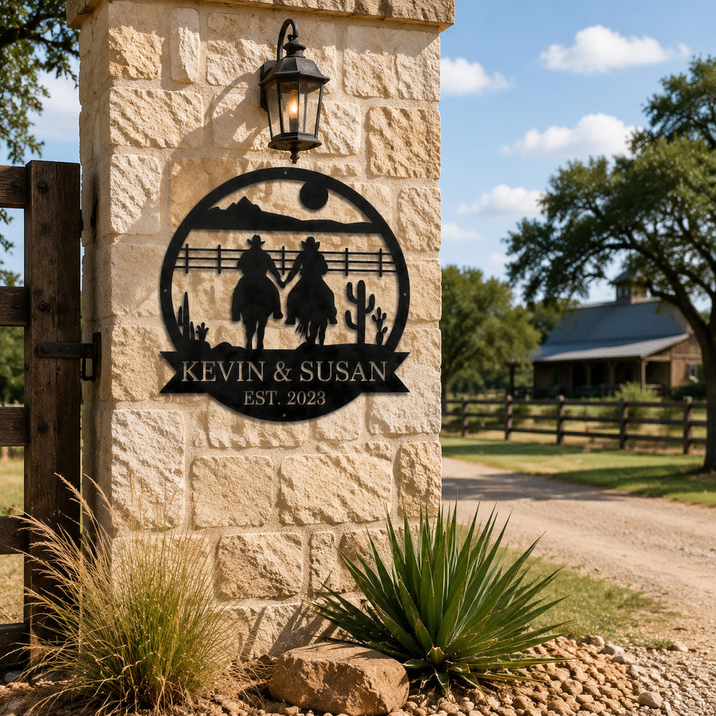 Personalized western cowboy couple metal wall sign mounted on rustic stone ranch entrance pillar, custom ranch decor for farmhouse driveway gate outdoor country home landscape