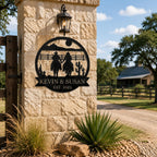 Personalized western cowboy couple metal wall sign mounted on rustic stone ranch entrance pillar, custom ranch decor for farmhouse driveway gate outdoor country home landscape