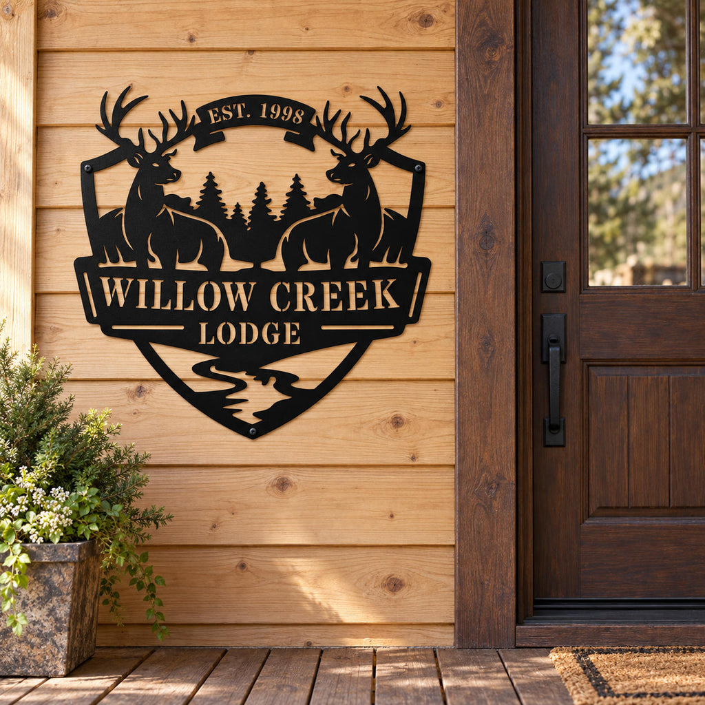 Personalized deer lodge metal sign mounted on cedar siding beside a cabin entrance.