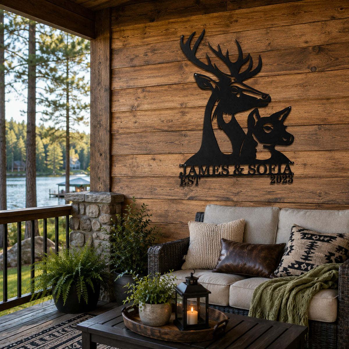 Custom deer family metal sign displayed on a rustic lake house patio overlooking a wooded lake.