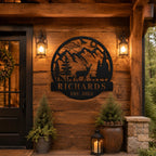 Personalized deer mountain family name metal sign mounted on the entrance of a rustic wooden cabin.