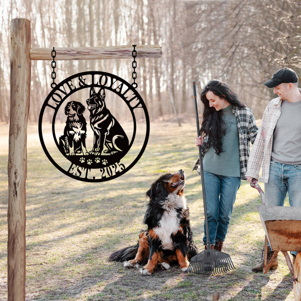 Custom circular dog metal sign featuring laser-cut German Shepherd and Bernese Mountain dog silhouettes with personalized text reading Love and Loyalty Est 2025.
