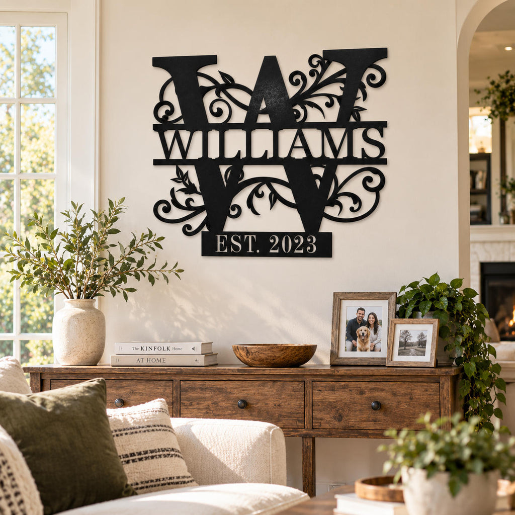 Custom Williams family name metal sign with floral monogram displayed on a warm living room wall.