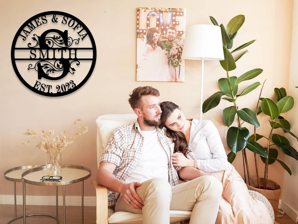 Custom round metal sign with couple's names, last name initial, and customizable EST. year.