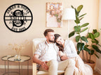 Custom round metal sign with couple's names, last name initial, and customizable EST. year.