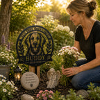 Dog owner placing flowers beside a personalized pet memorial metal sign in a remembrance garden