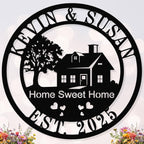 A custom metal sign with a silhouette of a house and tree, featuring the text 'Home Sweet Home' and the names 'KEVIN & SUSAN EST. 2023'.
