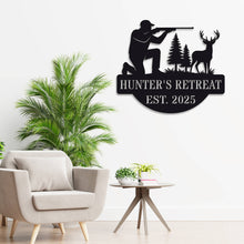 Personalized hunter metal sign showing kneeling man with rifle aiming at deer, rustic wall decor for hunting cabin or man cave, custom text and year, powder-coated steel design.