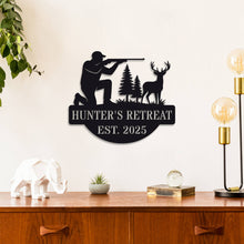 Personalized hunter metal sign showing kneeling man with rifle aiming at deer, rustic wall decor for hunting cabin or man cave, custom text and year, powder-coated steel design.