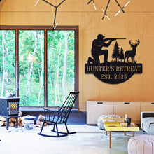 Personalized hunter metal sign showing kneeling man with rifle aiming at deer, rustic wall decor for hunting cabin or man cave, custom text and year, powder-coated steel design.