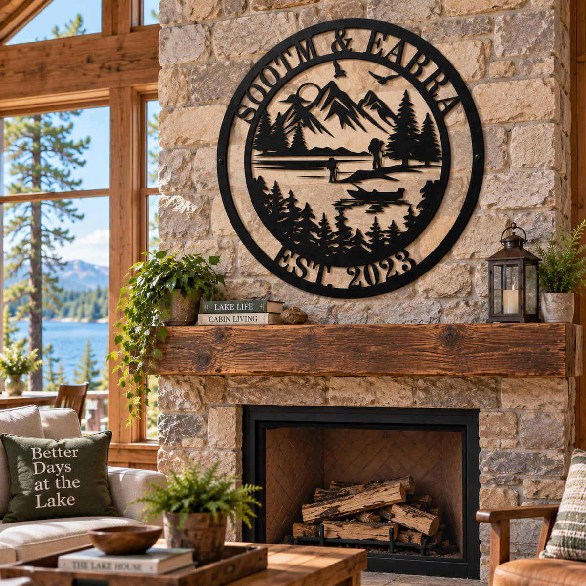 Custom lake house metal sign displayed above a rustic stone fireplace in a bright lakeside cabin living room.