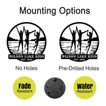 Custom lake kids metal sign featuring children silhouette design, personalized family name and year, round steel wall decor for lake house or cabin