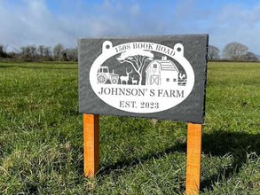 Custom metal farm sign with tractor, barn, deer, and tree design
