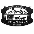 Personalized black metal farm sign isolated on a white background.