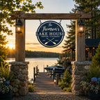 Personalized lake house metal sign displayed at a private dock entrance beside a peaceful lake.