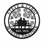 Personalized anniversary metal sign featuring custom couple names, anniversary text, roses, and couple silhouette wall decor in black powder coated steel