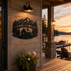 Personalized lake house metal sign displayed on a lakeside cabin porch at sunset.