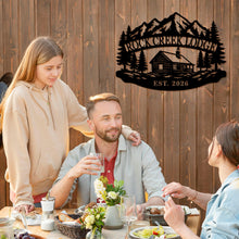 Custom mountain lodge metal sign featuring a cabin, pine trees, alpine mountains, and personalized lodge name with established year