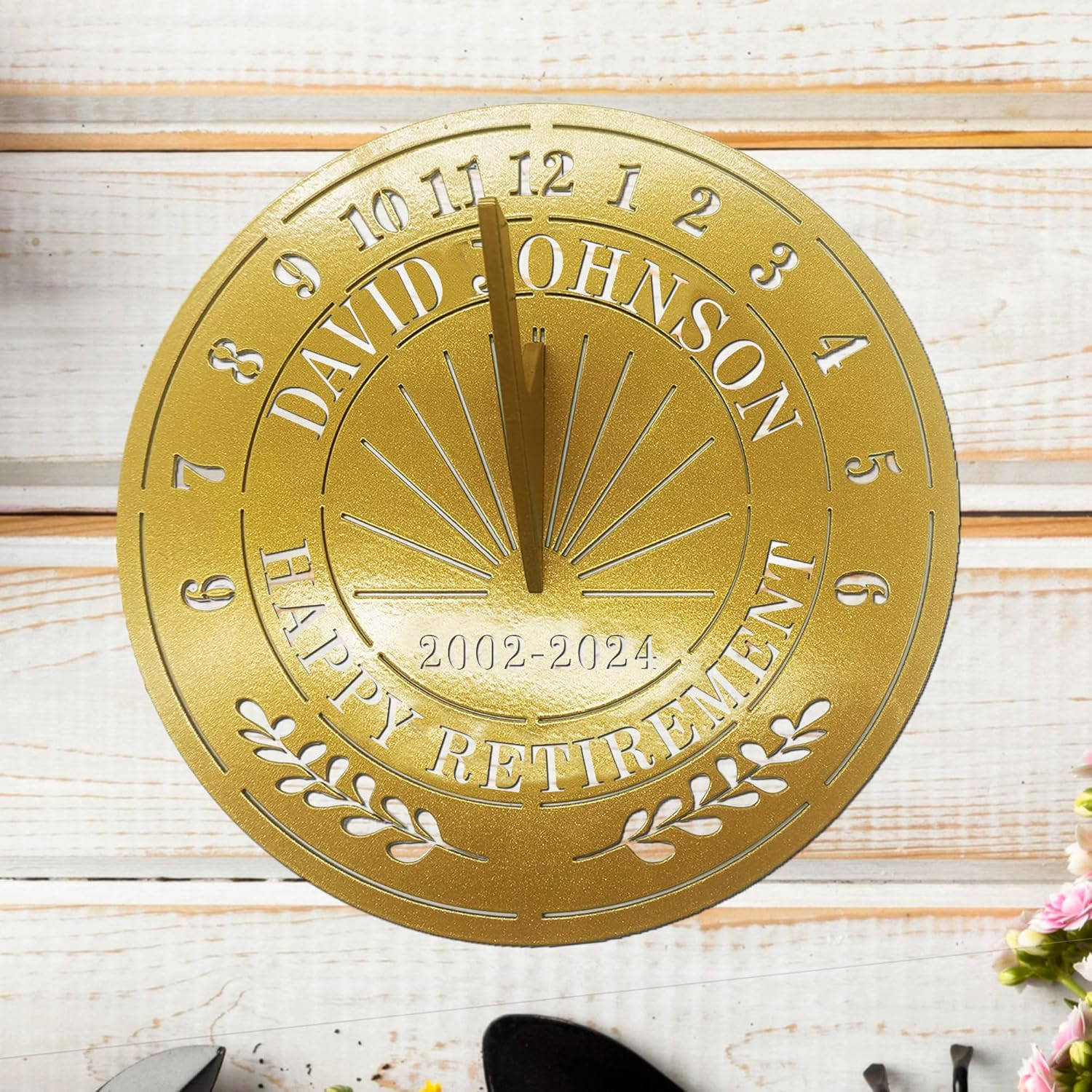 Personalized gold metal sundial with custom text "DAVID JOHNSON HAPPY RETIREMENT 2002-2024" and a central gnomon, designed for outdoor garden decoration. Main image