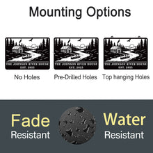 Custom river house metal sign with cabin, canoe, and forest design, personalized text, laser-cut steel, powder-coated rustic outdoor décor.