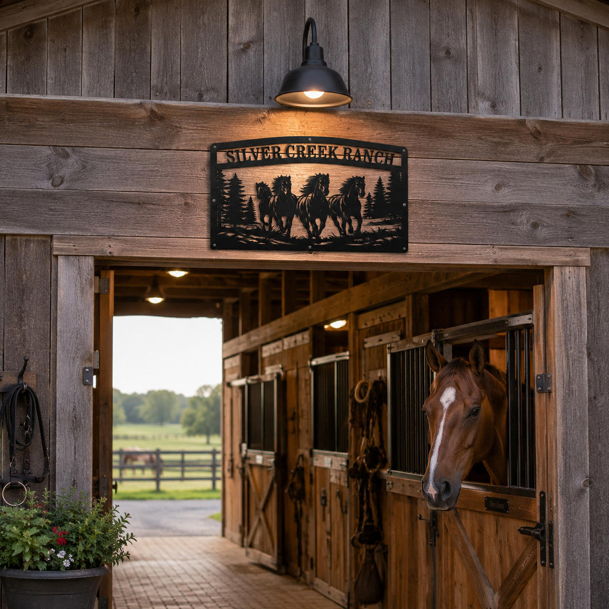 Custom horse farm metal sign displayed above stable entrance with running horse design
