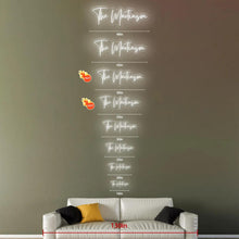 Custom script neon sign glowing in warm amber light with personalized text, decorative LED neon sign for bedroom and home décor, customizable font size and color