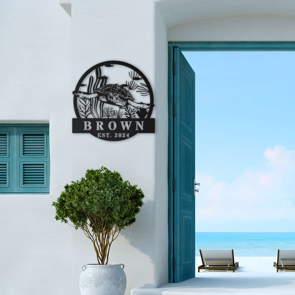 Custom metal sea turtle sign featuring coral reef and underwater ocean plants, personalized with family name and year – coastal décor made from powder-coated steel