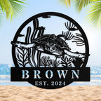 Custom metal sea turtle sign featuring coral reef and underwater ocean plants, personalized with family name and year – coastal décor made from powder-coated steel