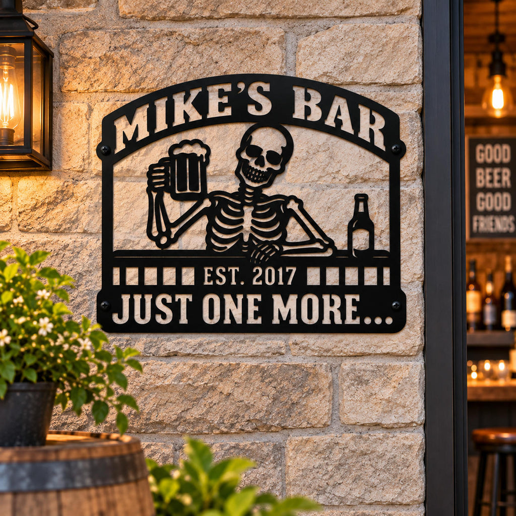 Custom skeleton bar metal sign mounted on a stone wall with four black screws beside a rustic home bar entrance.