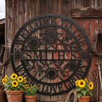 Custom round metal family name sign featuring laser-cut sunflowers and "Where Love Grows" text.