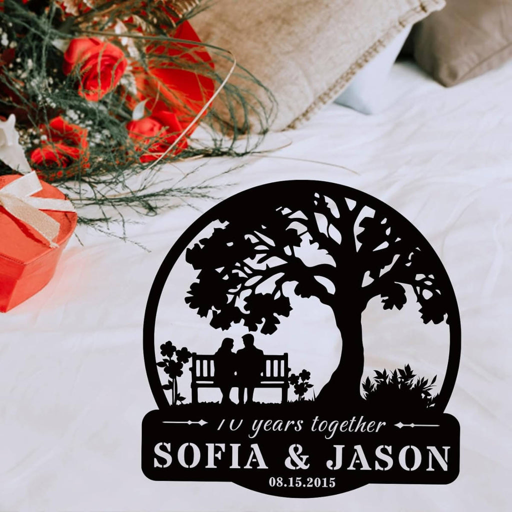 Custom tree metal sign with couple silhouette and personalized text, laser cut from steel and powder coated, ideal for wedding, anniversary, or family wall décor.