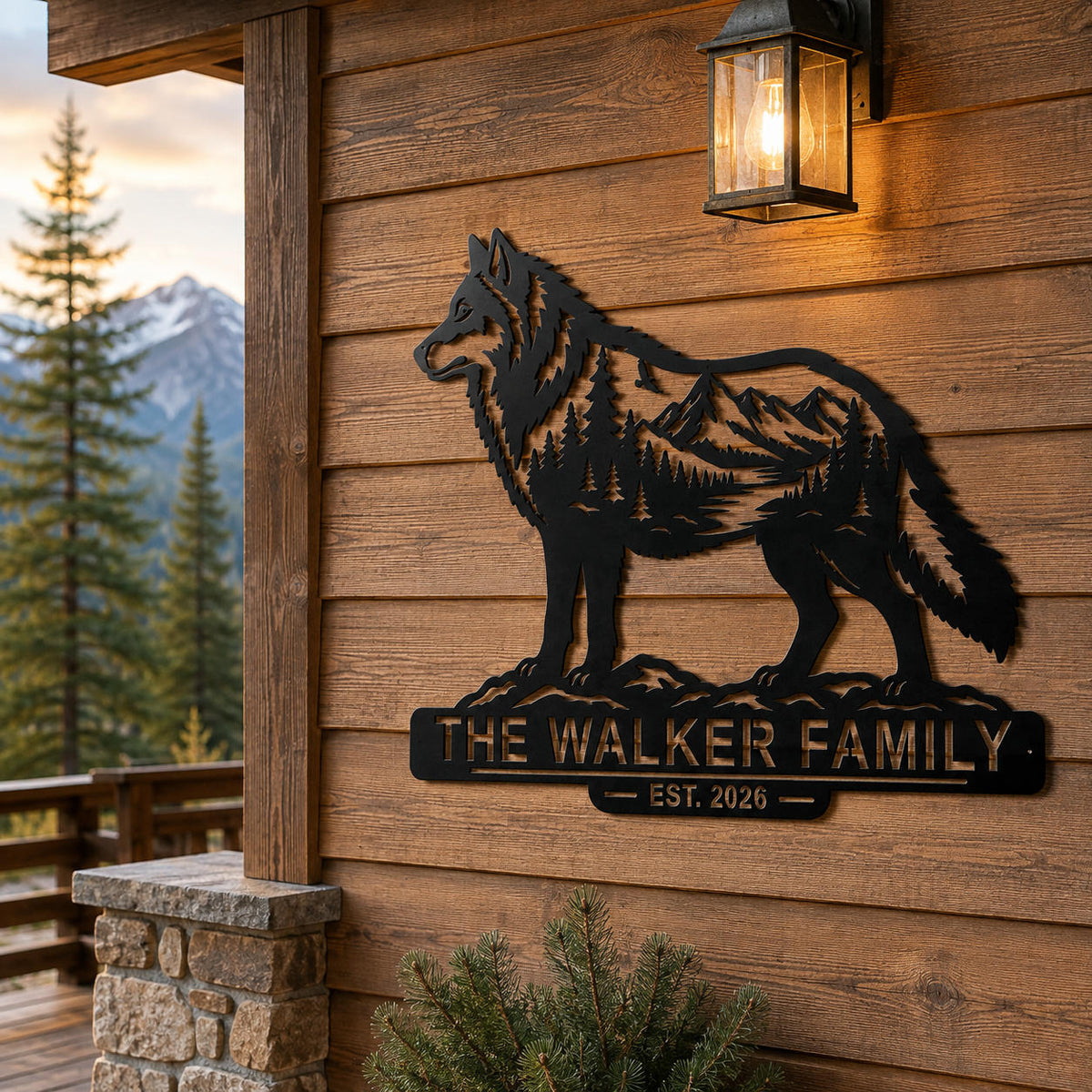 Custom wolf family metal sign displayed on a rustic mountain cabin exterior.