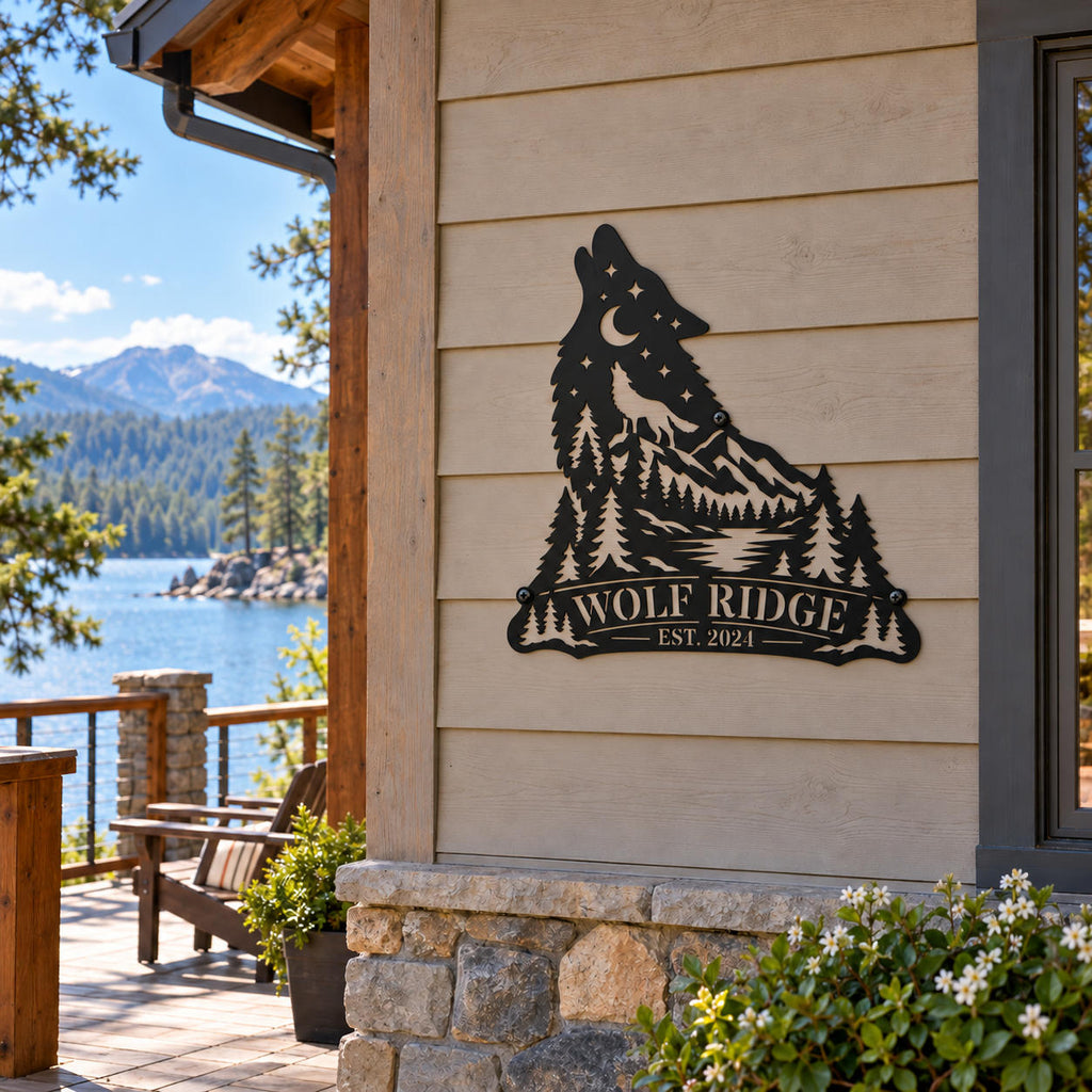 Personalized wolf metal sign mounted on a lakeside cabin wall overlooking a mountain lake.