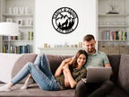 Custom howling wolf metal sign with forest, mountains, and personalized names – rustic family wall décor made from laser-cut steel