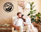 Custom howling wolf metal sign with forest, mountains, and personalized names – rustic family wall décor made from laser-cut steel