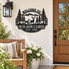 Personalized deer family metal welcome sign mounted on a home porch wall