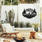 Custom deer forest metal welcome sign with personalized name and established year, featuring wildlife and pine trees in a bold laser-cut steel design