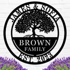Custom metal family tree sign with names and date laser-cut into black powder-coated steel for personalized home décor.