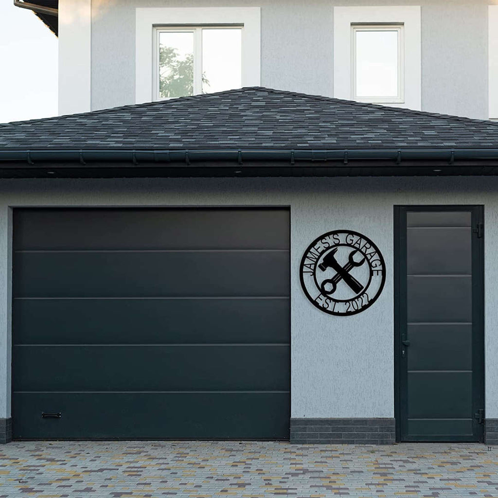 Personalized metal garage sign with custom name and crossed tools design