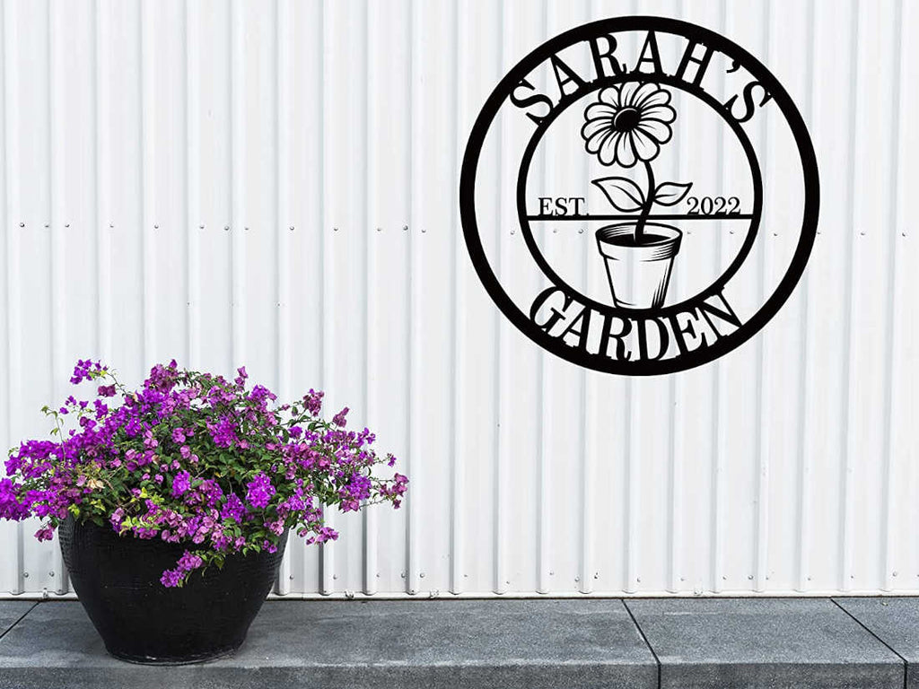 Custom metal garden sign with flower pot design and personalized name, laser-cut and powder-coated for outdoor decor