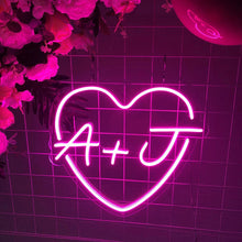 Custom heart initial neon sign with LED glow, featuring personalized letters inside a heart outline for home décor or romantic gifts