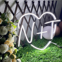 Custom heart initial neon sign with LED glow, featuring personalized letters inside a heart outline for home décor or romantic gifts