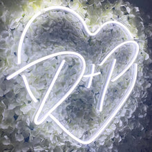 Custom heart initial neon sign with LED glow, featuring personalized letters inside a heart outline for home décor or romantic gifts
