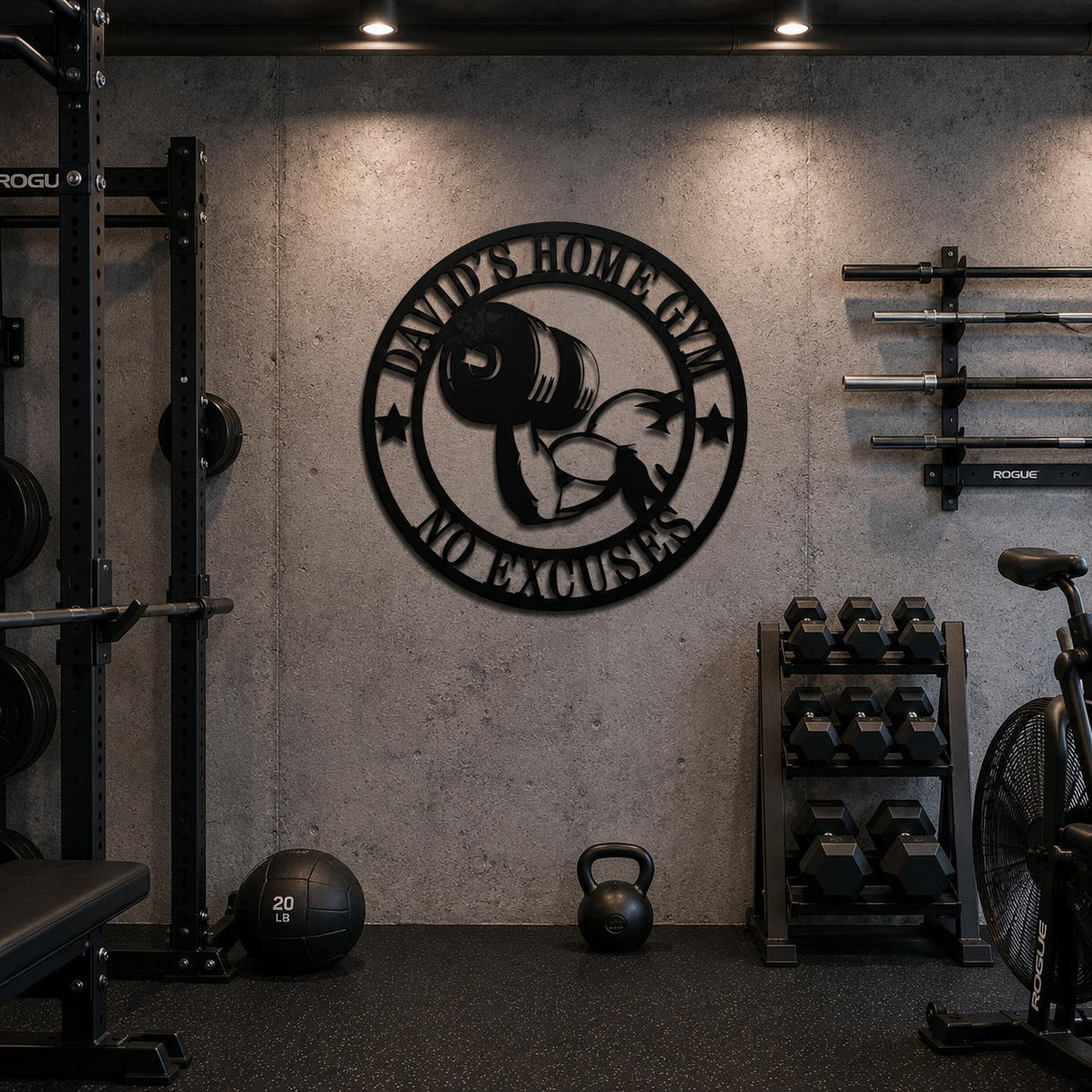Black personalized home gym metal wall sign installed in an industrial-style fitness room.