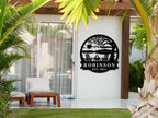 Personalized metal lakehouse sign with firepit, Adirondack chairs, and custom name and year, laser-cut from premium steel and powder-coated for outdoor or indoor use.