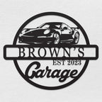 Personalized metal garage sign featuring a sports car silhouette and custom name with "Garage" and established year, laser-cut from durable powder-coated steel for indoor or outdoor use.