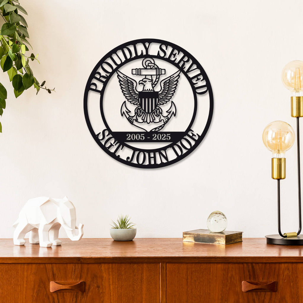 Custom military metal sign featuring eagle and anchor emblem, "Proudly Served" text, and personalized name, rank, and years of service. Laser-cut steel, powder-coated for durability.